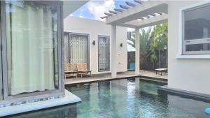 Swimmingpoolen hos eller tæt på Ohana Retreat Villa