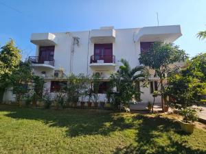 Zahrada ubytování Falcon guest house + 12 fotografií