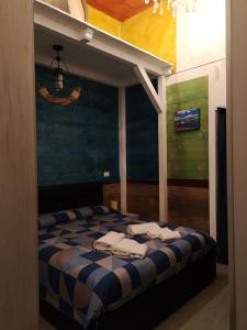 Postel nebo postele na pokoji v ubytování Marina Club