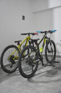 two bikes parked next to each other in a room at Viale Repubblica 307 4 in Pietra Ligure