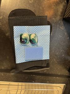 a pair of scissors sitting on top of a table at 25 Birks Road in Cleator Moor