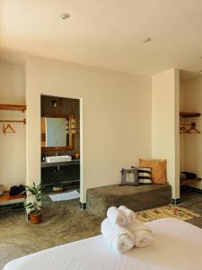 a bedroom with two beds and a mirror at Casa Zala in El Paredón Buena Vista +79 photos