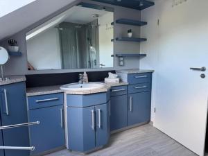 Køkken eller tekøkken på FeWo LiLo + 20 billeder