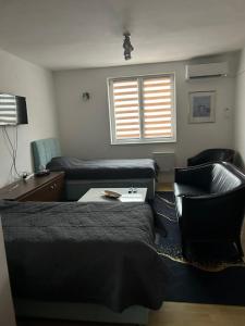 Posezení v ubytování Sarajevo Holiday Apartments 2