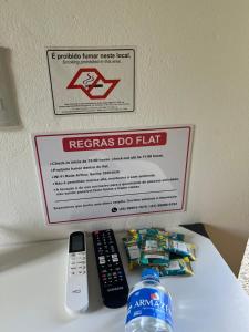 Et logo, certifikat, skilt eller en pris der bliver vist frem på Flat privativo Residencial Schlichting