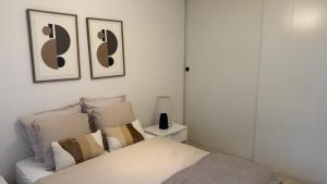 En eller flere senge i et værelse på Superbe T2 avec Terrasse Tout équipé