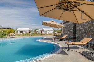 Bazén v ubytování jüSTa Luxé - Highpoint Jawai nebo v jeho okolí