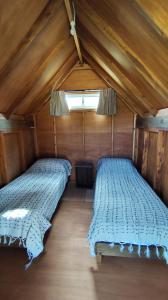 Giường trong phòng chung tại Soñar Despierto