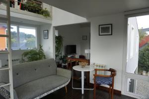 a living room with a couch and a table at Casa Towanda in San Carlos de Bariloche +28 photos