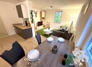 Posezení v ubytování Natur-Apartment am Großen Arber Netflix WIFI + 70 fotografií