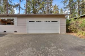 a garage with a white garage door at Gold rush nook in Grass Valley
