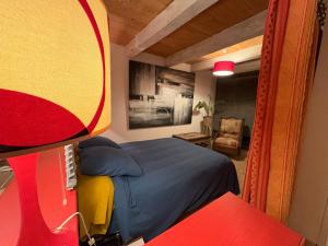 Giường trong phòng chung tại Saures