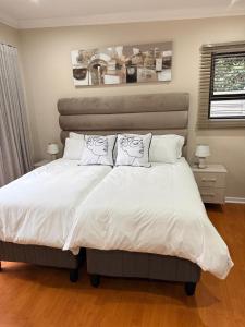 Giường trong phòng chung tại Cathy & P Guesthouse +13 ảnh