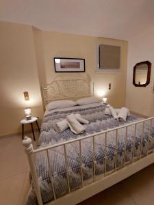 En eller flere senge i et værelse på Lerici Natural Suite con Wi-Fi