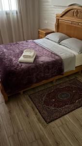 Giường trong phòng chung tại Élégance et Confort à Proximité de la Plage +3 ảnh