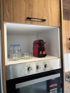 Nhà bếp/bếp nhỏ tại Élégance et Confort à Proximité de la Plage