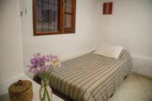 En eller flere senge i et værelse på La Cabañita de Tilcara