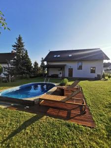 Bazén v ubytování Rodinná Rezidence Žihobce - prázdninový dům nebo v jeho okolí