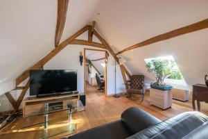 TV a/nebo společenská místnost v ubytování Le Plexus - Sérénité & relaxation - Villa 9 personnes