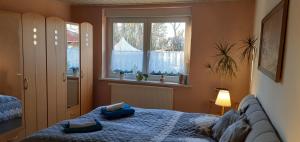 Postel nebo postele na pokoji v ubytování Zur alten Jugendherberge