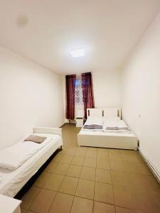 Postel nebo postele na pokoji v ubytování Big apartment in Brandýs nad Labem