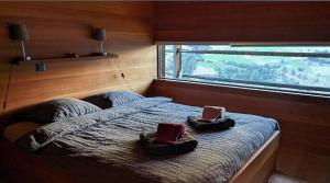 Postel nebo postele na pokoji v ubytování La Grange de Léonore - Maison de l'année, Valais