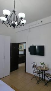 Et tv og/eller underholdning på City Center Apartments