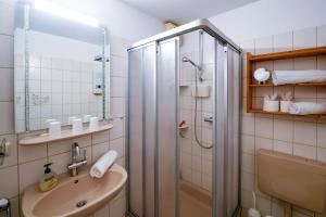 Koupelna v ubytování Haus Horizont I HZ06 + 13 fotografií