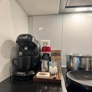 Kuchyň nebo kuchyňský kout v ubytování Apartment im Zentrum St Gallen + 2 fotografie