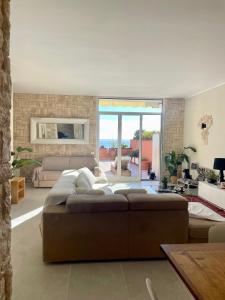 Et opholdsområde på Casa Della Baia With a beautiful view