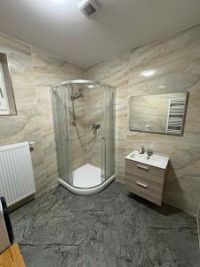 Koupelna v ubytování Apartmány u Honzíka