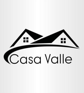 ein Logo für ein Immobilienunternehmen mit zwei Häusern in der Unterkunft Casa Valle in Rozzano