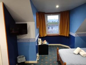 Giường trong phòng chung tại The limes B&B