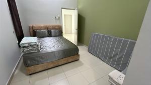 a bedroom with a bed in a room at 1091 LUX Conner in Port Dickson