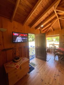 Et tv og/eller underholdning på Cabaña BANDURRIA