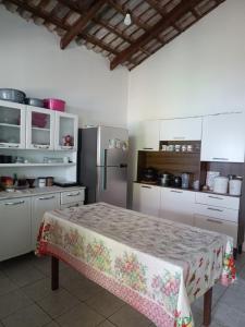 Nhà bếp/bếp nhỏ tại Casa de Hóspedes em Cavalcante Goiás +6 ảnh