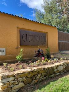 a building with a sign that says la cordoba at Finca La Condalia in Nemocón