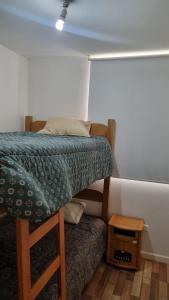 Postel nebo postele na pokoji v ubytování Condominio Bordemar Las Cruces