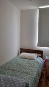 Postel nebo postele na pokoji v ubytování Condominio Bordemar Las Cruces + 11 fotografií