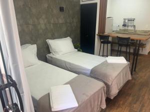 En eller flere senge i et værelse på Pousada Verde Serrath