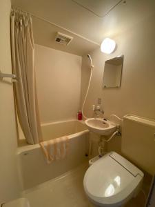 Et badeværelse på 歩絵夢の森 Pension Poem no mori