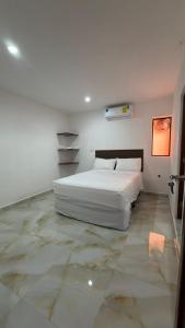 Un pat sau paturi într-o cameră la Aldea mi Casa