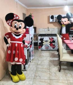 a large statue of mickey mouse standing in a kitchen at Casa de Temporada 5 Estrelas in Olímpia