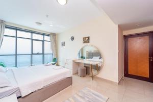 En eller flere senge i et værelse på Ocean View Luxurious Homes + 31 billeder