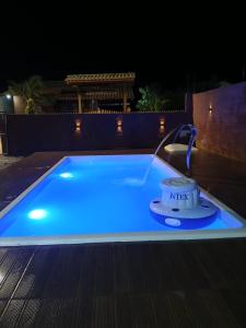 Swimmingpoolen hos eller tæt på Casa com piscina 5 muitos da praia do sonho