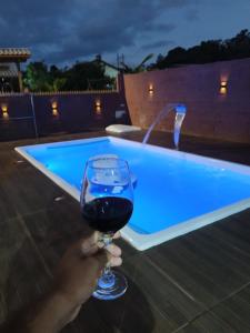 Swimmingpoolen hos eller tæt på Casa com piscina 5 muitos da praia do sonho + 7 billeder