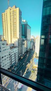 a view from a window of a city with buildings at Amazing View Studio Obelisco in La Porteña