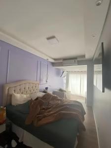 En eller flere senge i et værelse på Casa Deus é Amor