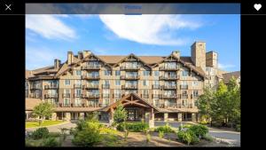 a rendering of a large apartment building at Suncadia Lodge in Cle Elum