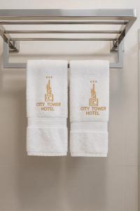 Et logo, certifikat, skilt eller en pris der bliver vist frem på City Tower Hotel + 47 billeder